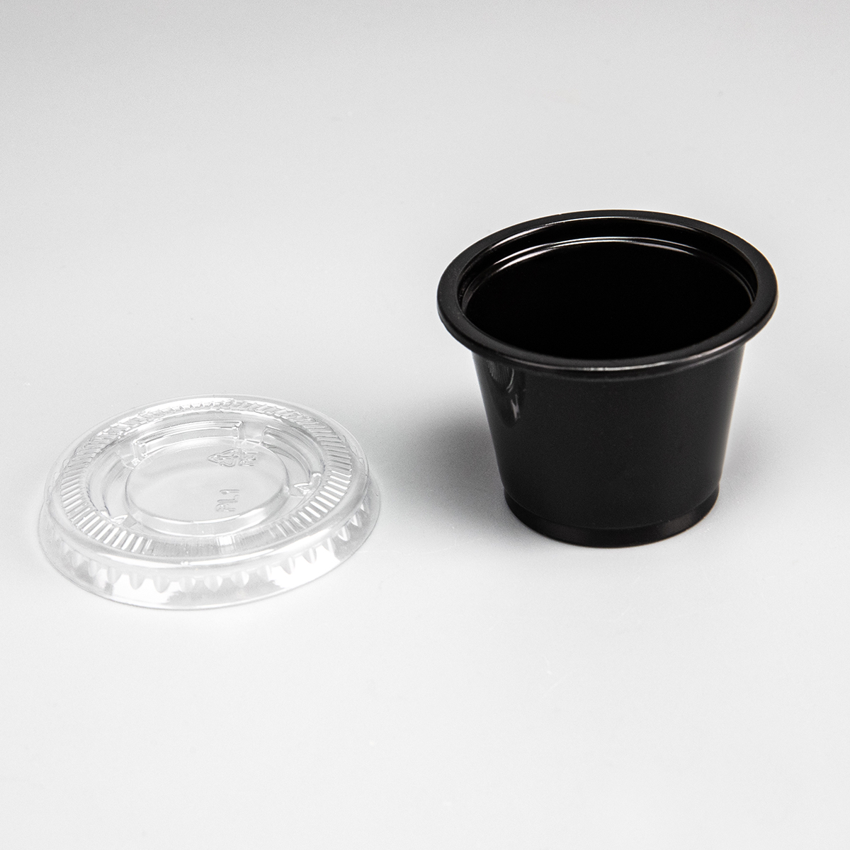 Taza de salsa de plástico PP transparente o negro de 0,5 oz